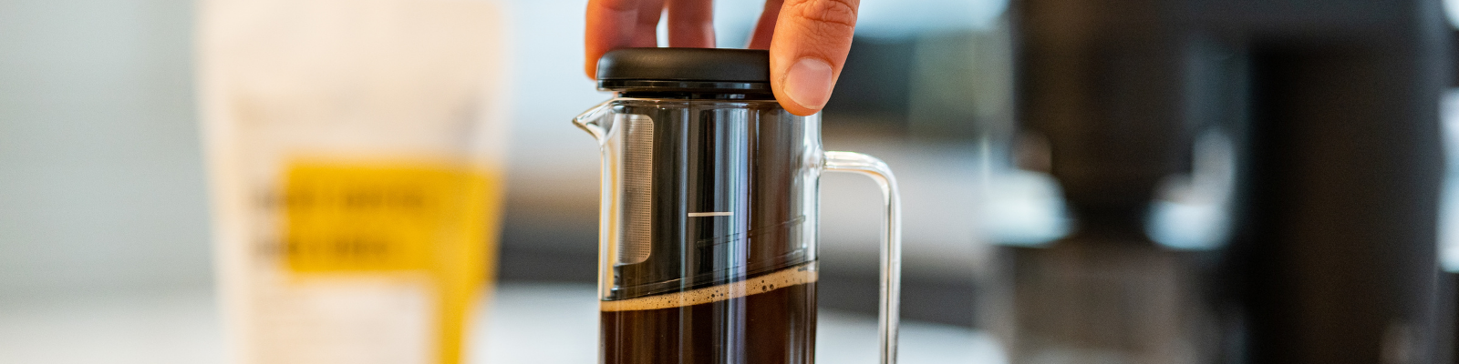 One Brew coffee maker brewing fresh beans 