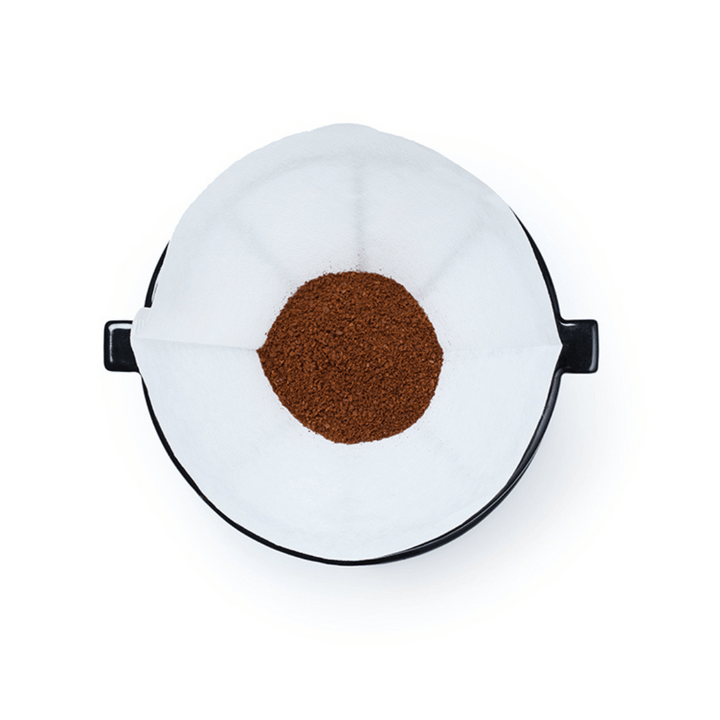 ground coffee in pour over