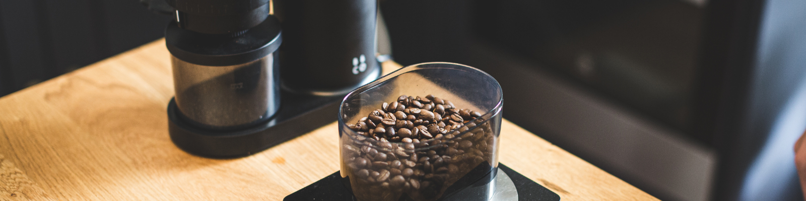 grinding coffee with core all grind by barista and co